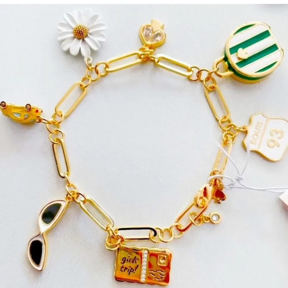 Kate Spade Gold off we go travel charm bracelet NWT -Dust Bag Included
